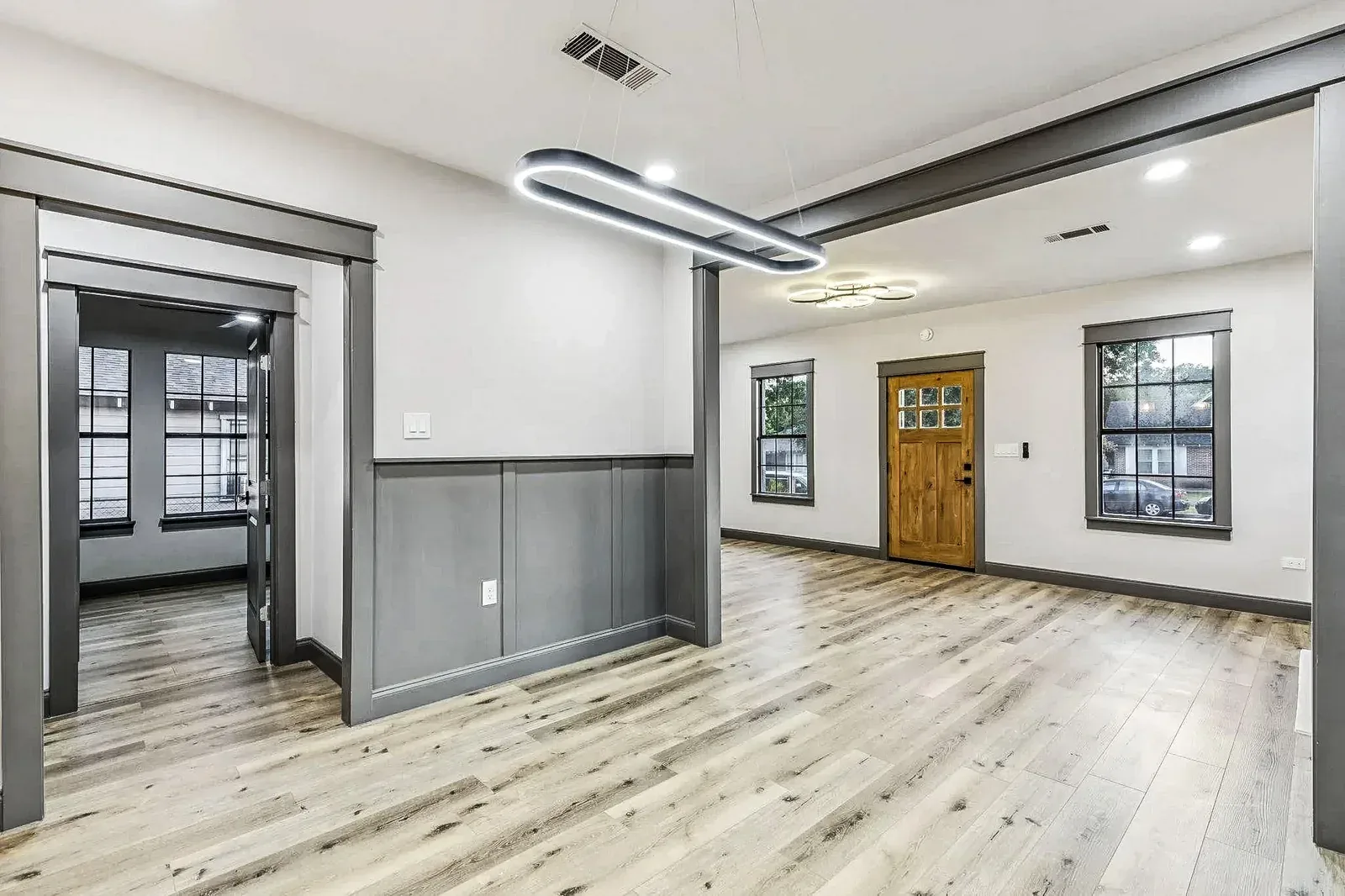 Open-concept living space created through coordinated design and construction
